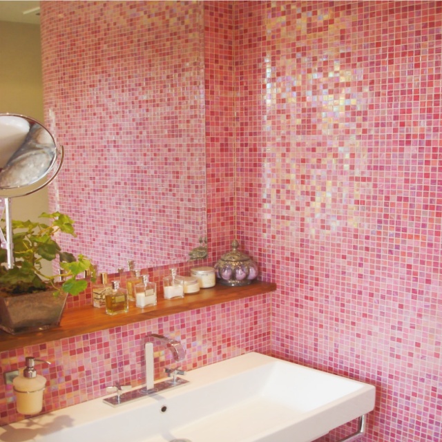 Professional mosaic tile installation process showing precise layout and technical application